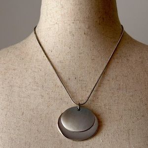 Silver-toned double oval pendant